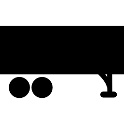 vrachtwagencontainer zwart rechthoekig silhouet over wielen icoon