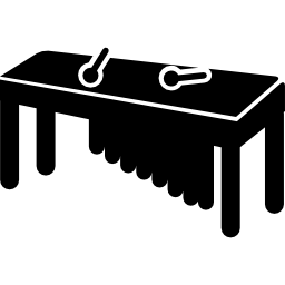 ksylofon na stole z kijami ikona