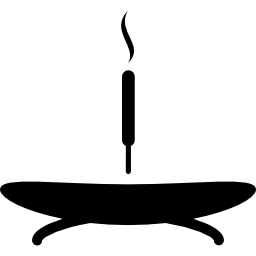bastoncino di incenso su una base icona