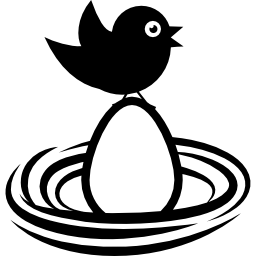 Bird on an egg in a nest icon
