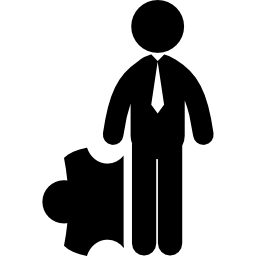 biznesmen stojący z kawałkiem układanki ikona