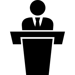 Businessman behind podium giving a speech icon