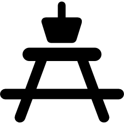 cesta encima de la mesa icono