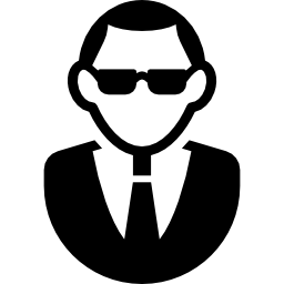 Человек в солнцезащитных очках и костюме иконка