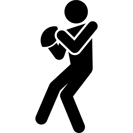 silueta de jugador de rugby con el balón en las manos  icono