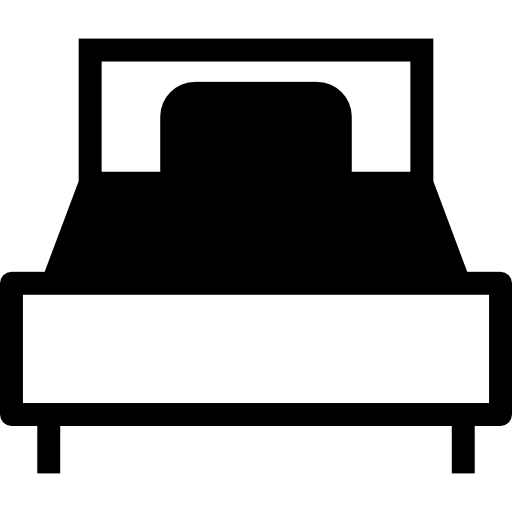 cama grande con una almohada  icono
